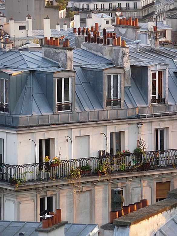  10)  Sunset glowing on classic Haussmannian buildings.  An enchanting view of Paris.